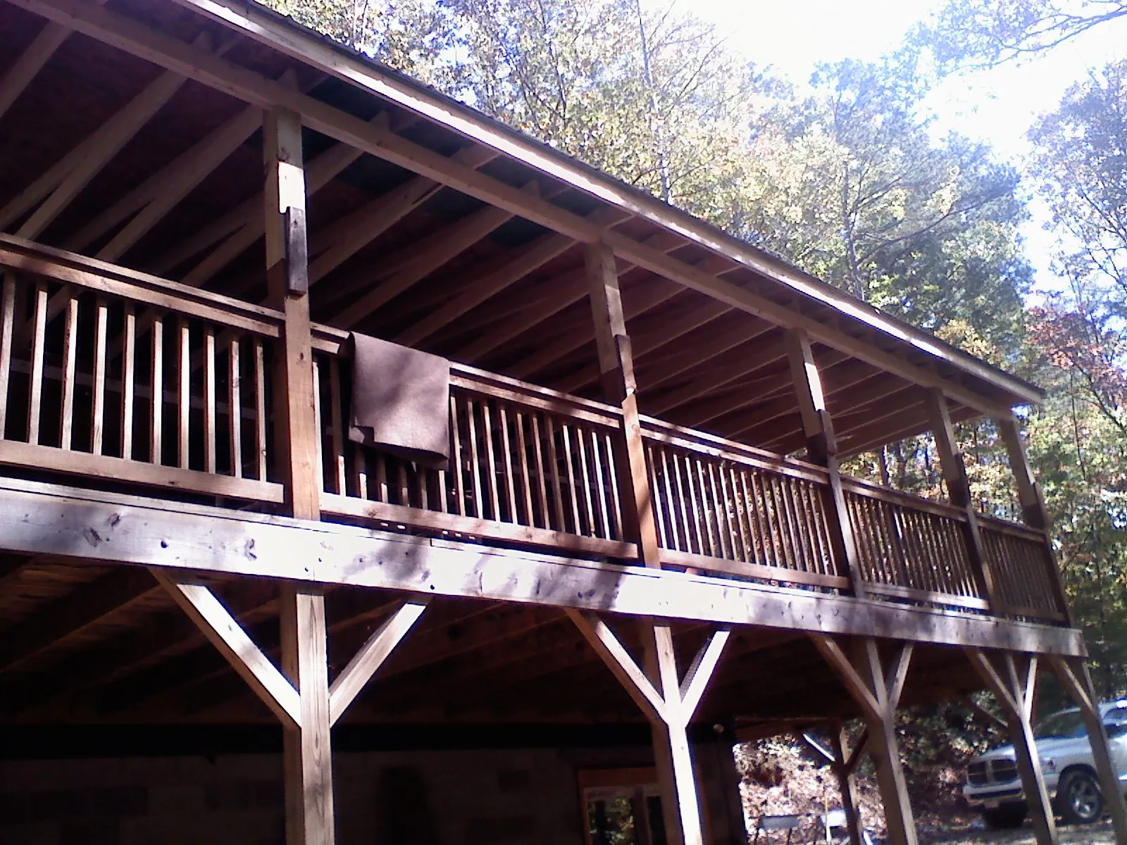 Timber framing under a new elevated porch and deck — Roof Leak Repair in Lawrence Township by Roofing Brothers